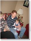 20070211JamesParty.jpg 020 * My uncle Jay got to hold me this time as much as he wanted. * 1944 x 2592 * (1.7MB)